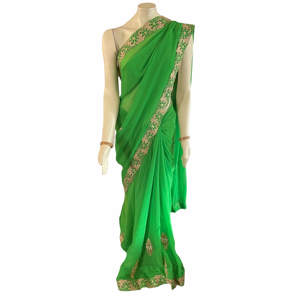 Vibrant Green Sari with Intricate Gold Embroidery